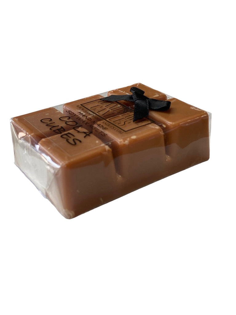 Soy wax melts with the nostalgic scent of cola cubes. Ideal for electric wax melt burners, bringing a sweet and tangy aroma to your home.