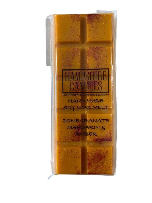 Soy wax melts with pomegranate, mandarin, and amber fragrance. Ideal for electric wax melt burners and creating a refreshing, fruity atmosphere.
