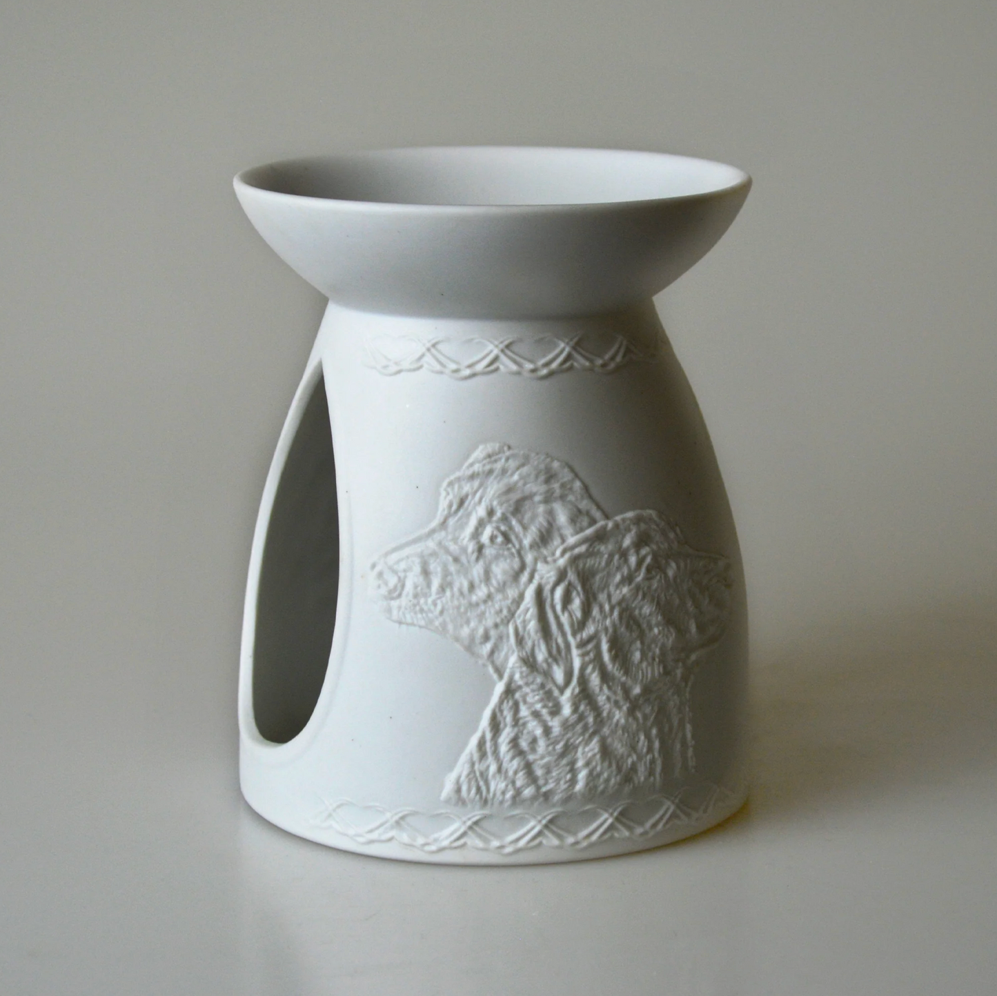 Pet-inspired wax melt burner in a dog design, perfect for cosy scent experiences