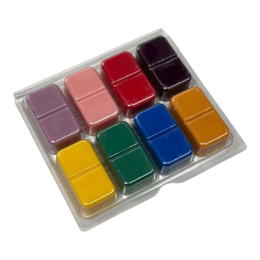 Close-up of juicy scented wax melts including Black Cherry, Pink Lemonade, and Pineapple & Mango in the Fruity Collection Box.