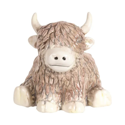 Front View: A beautifully detailed ceramic Highland Cow wax melt burner with a rustic design, perfect for adding charm to any home.