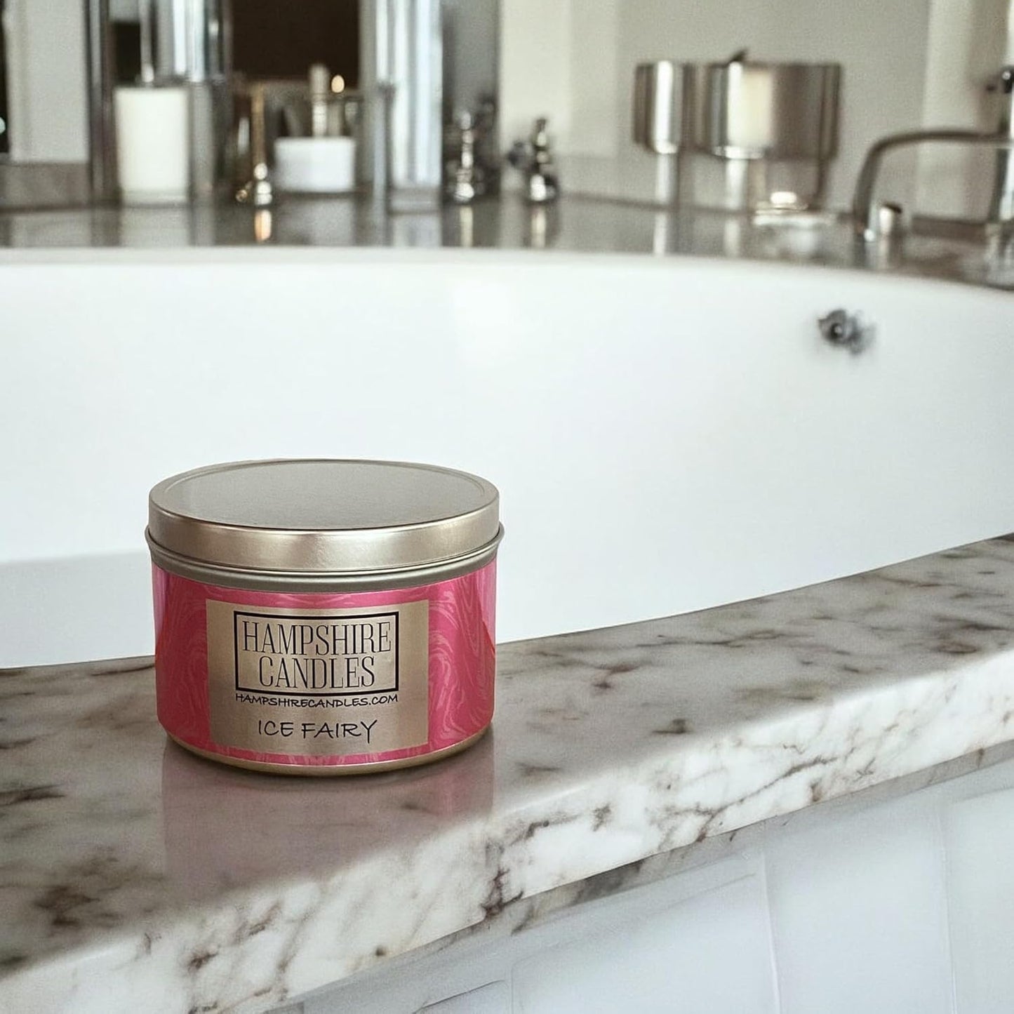 Hand-poured Ice Fairy soy wax candle with pink hue and Snow Fairy-like fragrance, perfect gift idea.