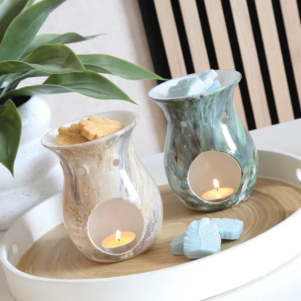 Jade marble wax melter with lit tea light candle décor