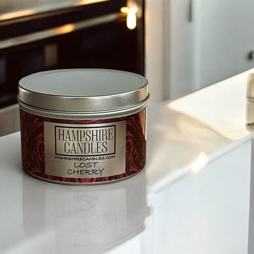 Lost Cherry fragrance tin candle, perfect for elevating your space with luxury aroma