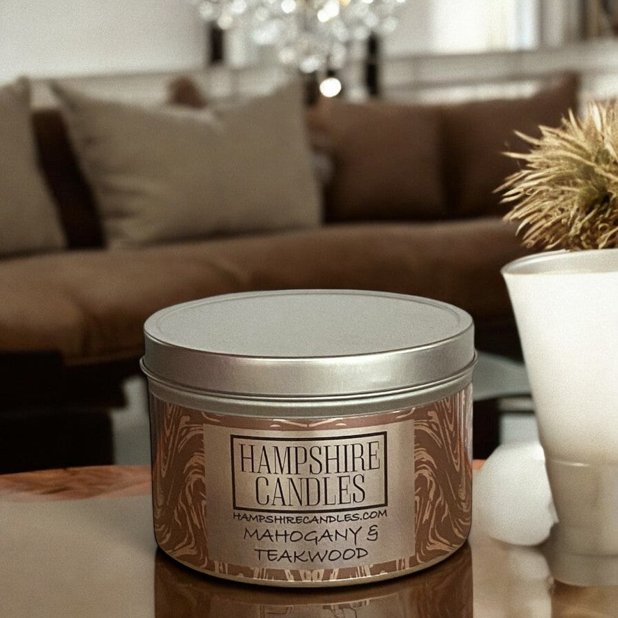 Beautifully designed Mahogany and Teakwood scented candle in a convenient tin