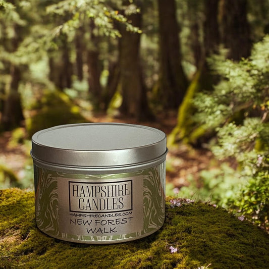 A New Forest Walk scented candle, with a soft, earthy design, capturing the aroma of pine trees, wildflowers, and moss-covered paths. Perfect for bringing a refreshing woodland atmosphere into your home.