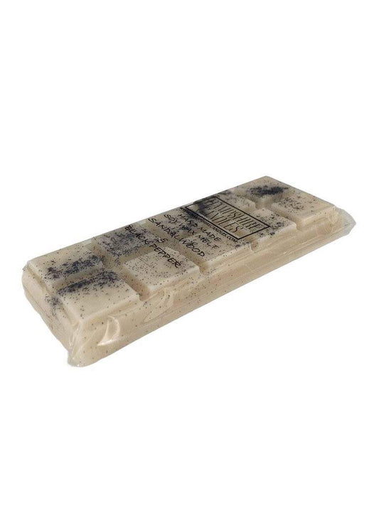 Soy wax melts with the grounding scent of sandalwood and spicy black pepper. Ideal for electric wax melt burners, filling your home with a deep, calming aroma
