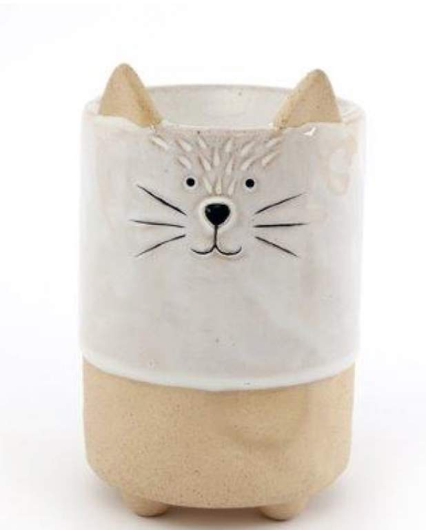 Tea light burner in use, with a lit candle and wax melt releasing fragrance.