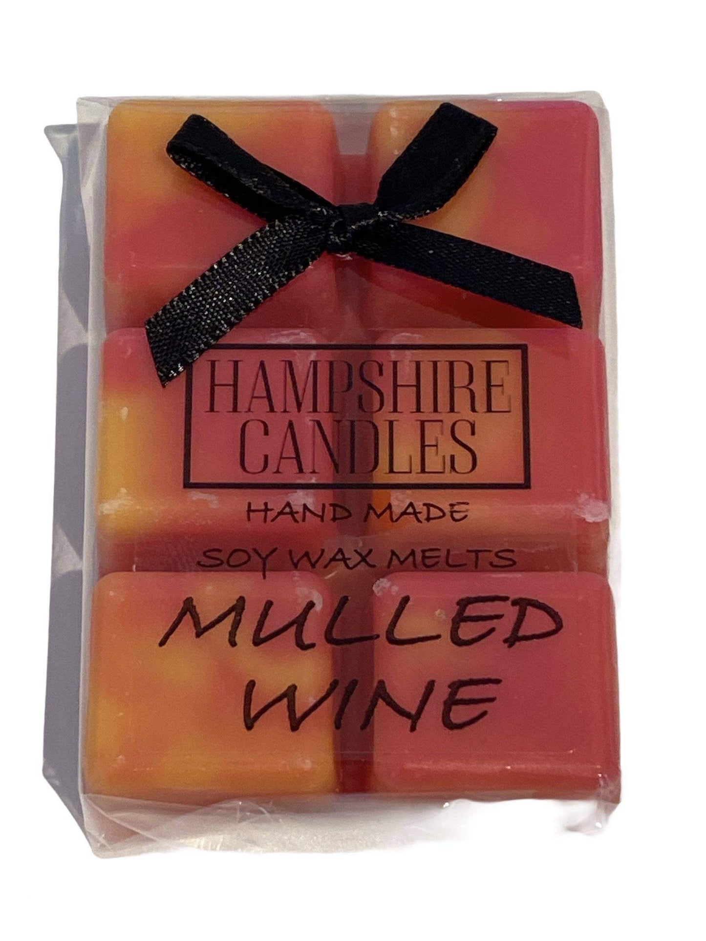Mulled Wine Scented Wax Melts – Warm and festive wax melts with sweet wine, berries, cinnamon, and vanilla for a cozy winter fragrance.