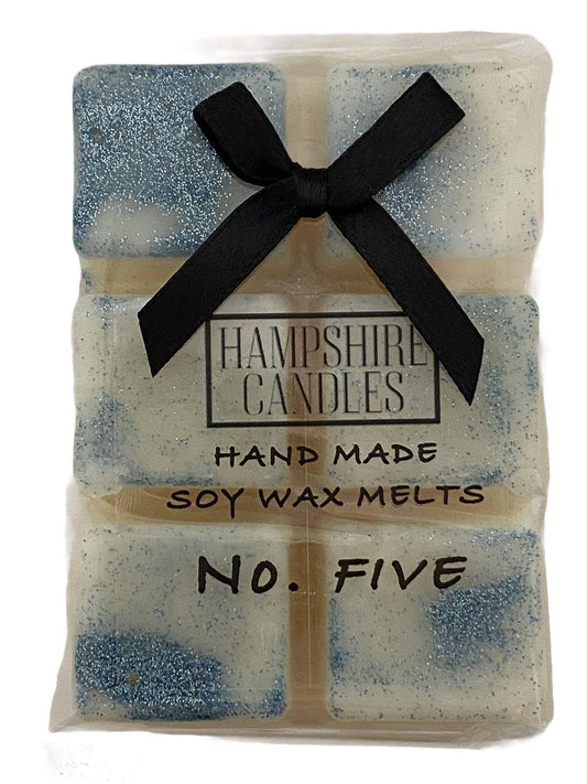 Perfume-Inspired Wax Melts – Elegant wax melts featuring rose, geranium, sandalwood, and white musk.