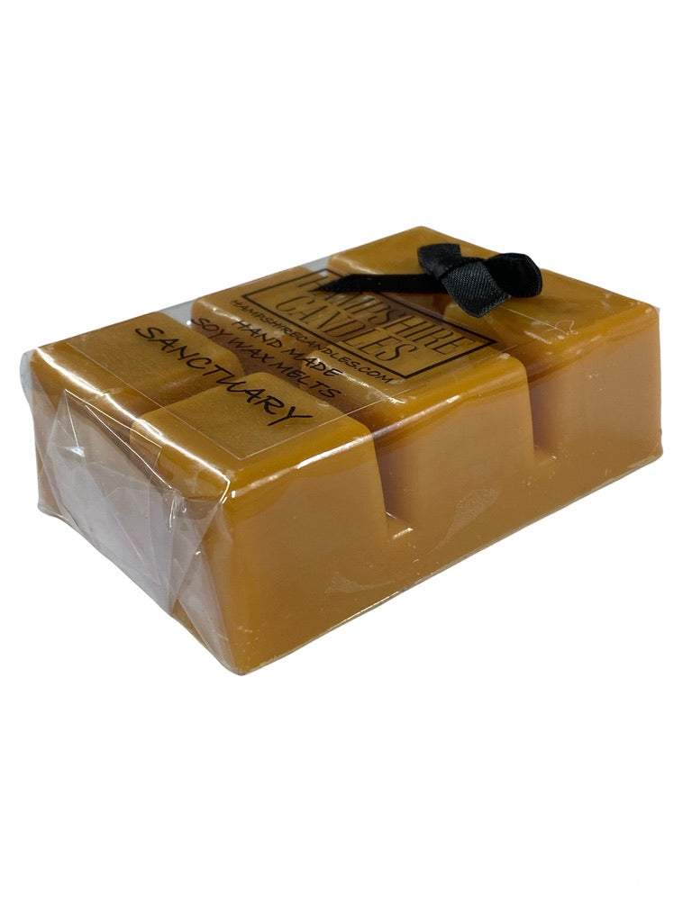 Sanctuary scented wax melts in a decorative bowl, showcasing their delicate texture and calming fragrance