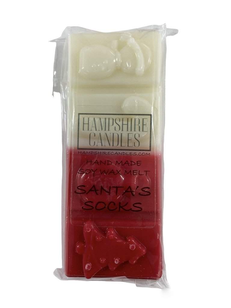 Santa’s Socks scented soy wax melts with notes of eucalyptus, magnolia, violet, neroli, cashmere, and sandalwood, perfect for a cosy and Christmas Wax Melts home fragrance.