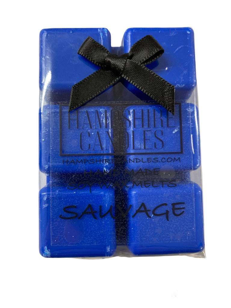 Sauvage scented wax melts in a sleek dish, showcasing their bold and masculine fragrance inspired by luxury aftershave