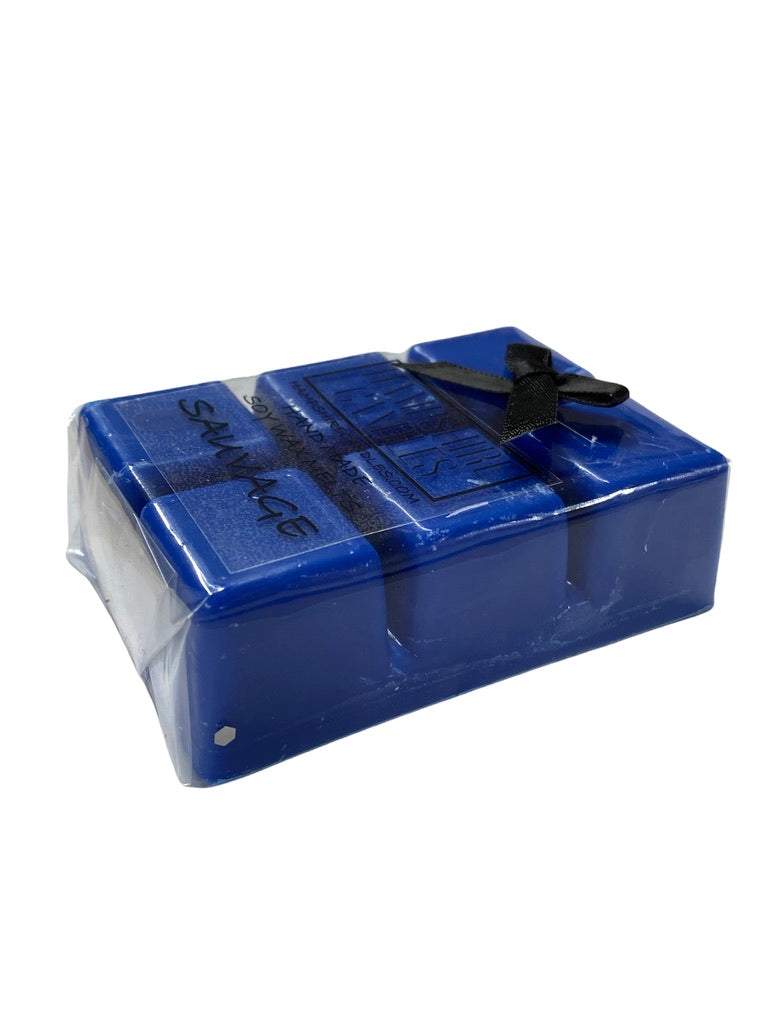 Close-up of Sauvage wax melts, infused with bergamot, pepper, vetiver, and cedar for a powerful woody scent