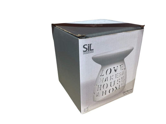White ceramic wax melt burner with "Love Makes a House a Home" quote, ideal for wax melts and essential oils. Elegant home fragrance burner for aromatherapy.