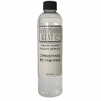 Hampshire Scent Co. Christmas By The Fire handmade room spray in a 300ml clear bottle with black screw cap