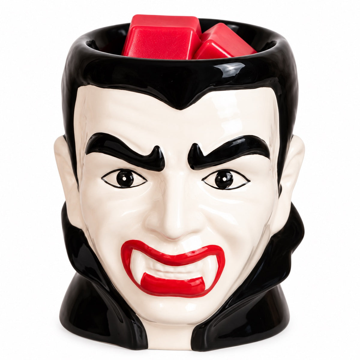 Dracula Halloween wax melt burner with red soy wax melts in the top dish
