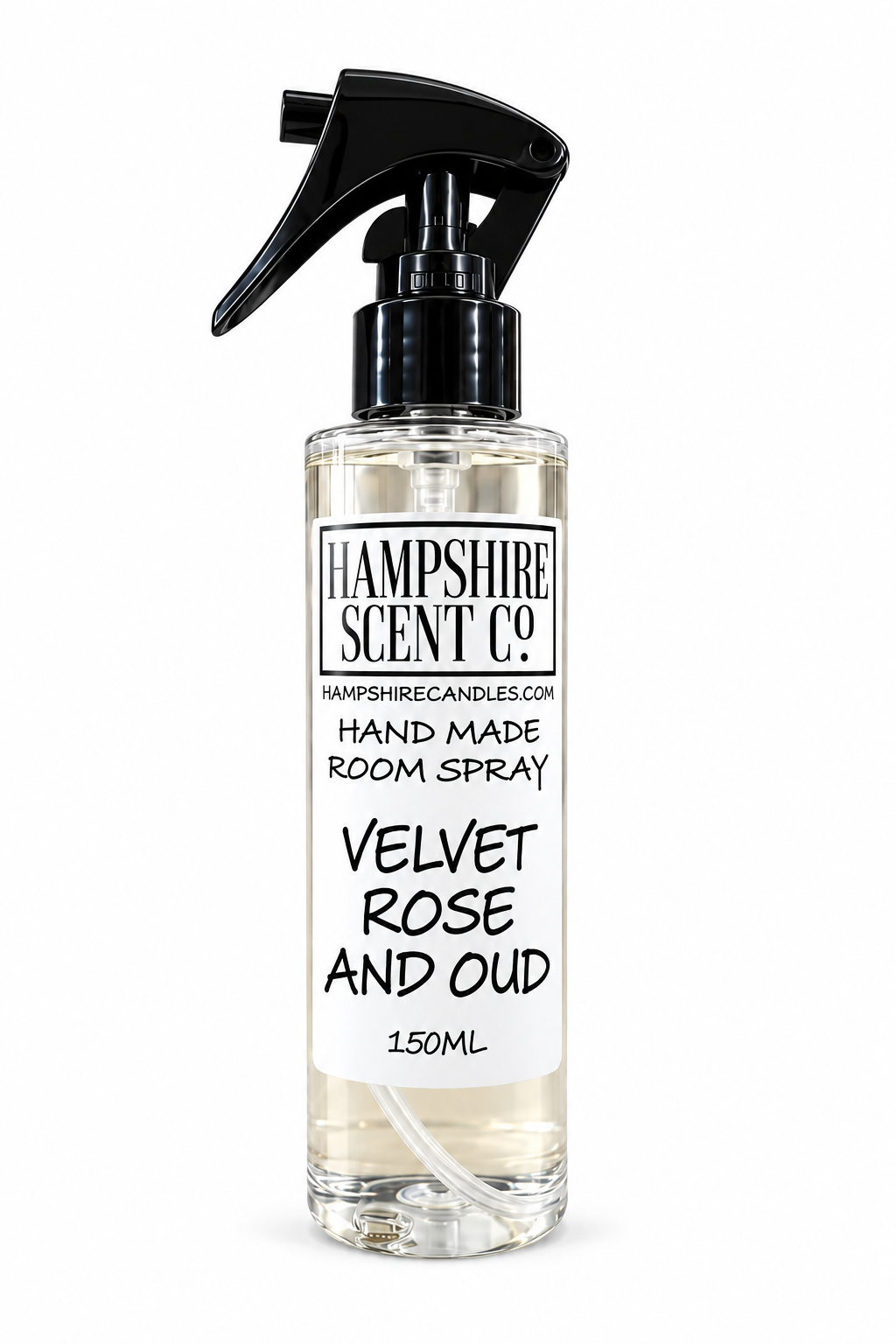 A 150ml clear room spray bottle with a black trigger spray cap, featuring a white label for Hampshire Scent Co. 'Velvet Rose and Oud' scent.