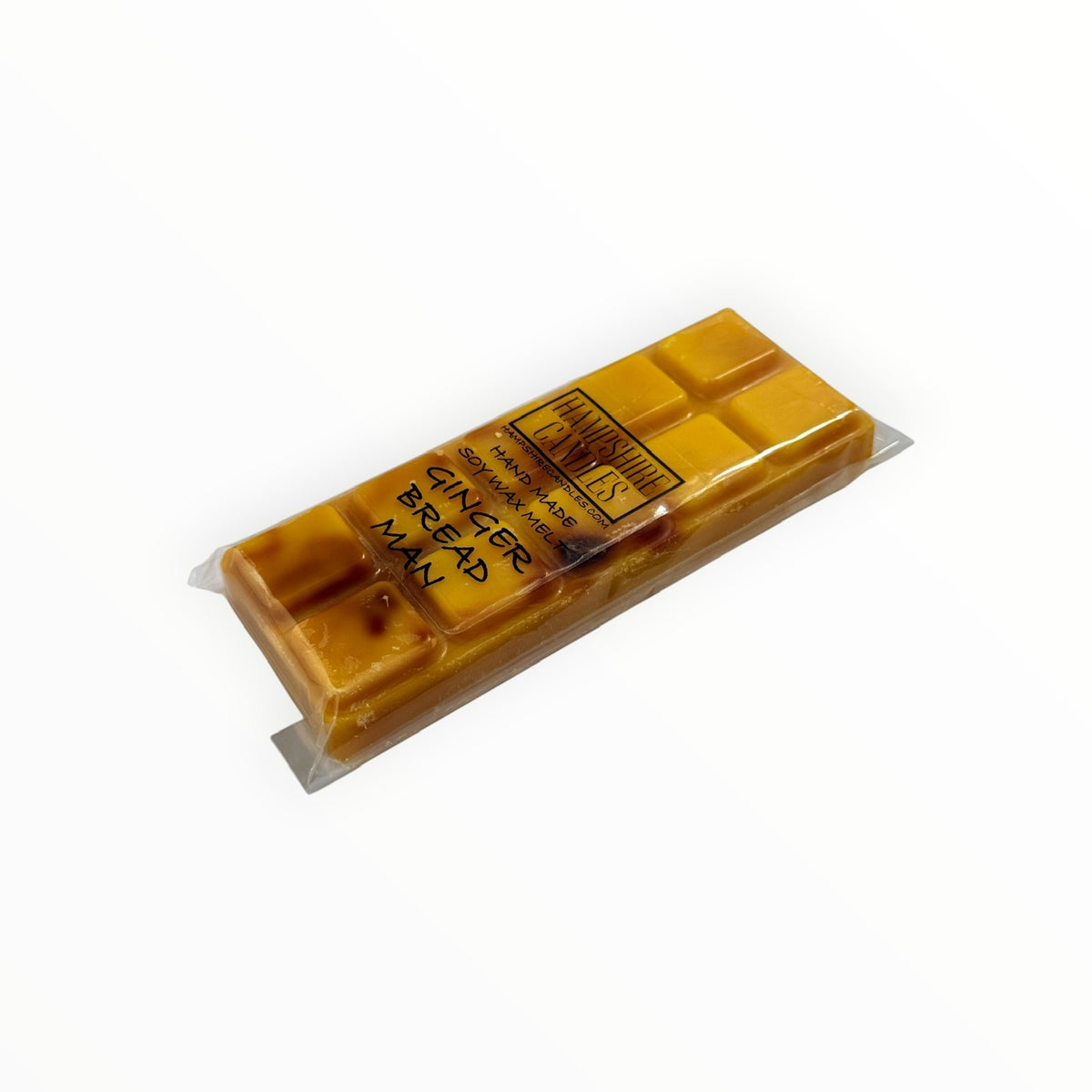 Gingerbread Man Mini Snap Bar wax melt lying flat, showing the golden amber snap segments