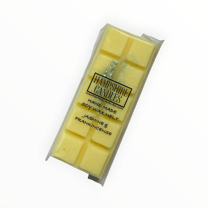 Jasmine & Frankincense Mini Snap Bar soy wax melt in pale yellow with a streak of glitter, in clear cellophane