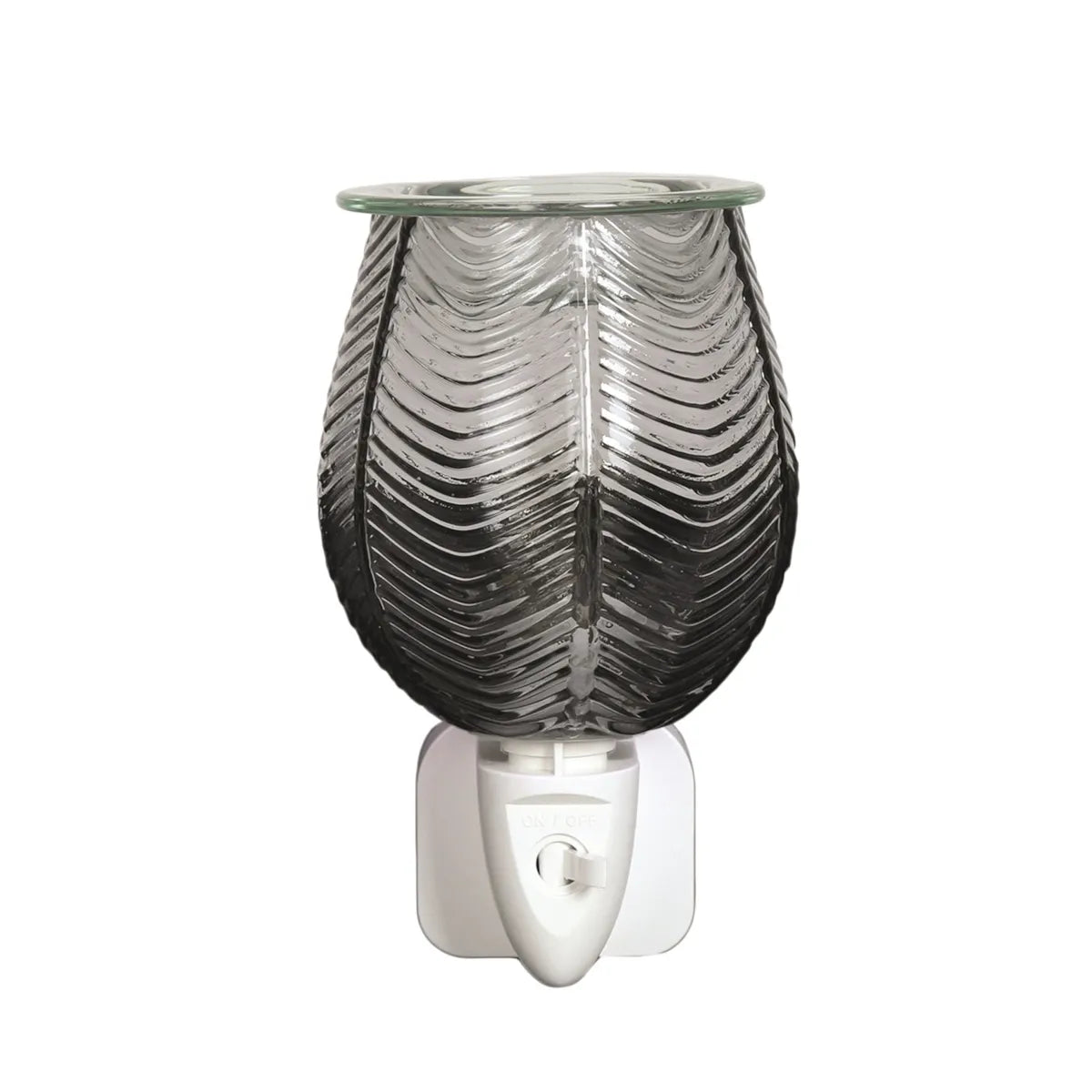 Add fragrance and style to your home with the Ribbed Grey Lustre Plug-In Wax Melt Burner. Elegant textured glass design with bulbs and dishes included.