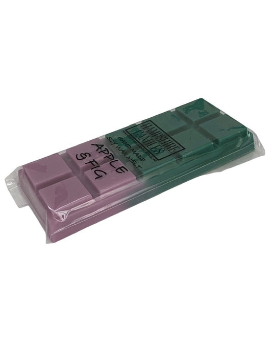 Pink and green wax bar with 'Apple and Fig' branding on a white background