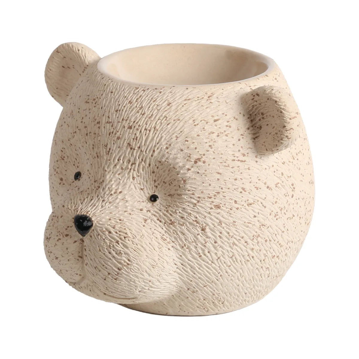 Bear tealight wax melt burner displayed in a cosy home setting while warming scented wax melts in the top dish.