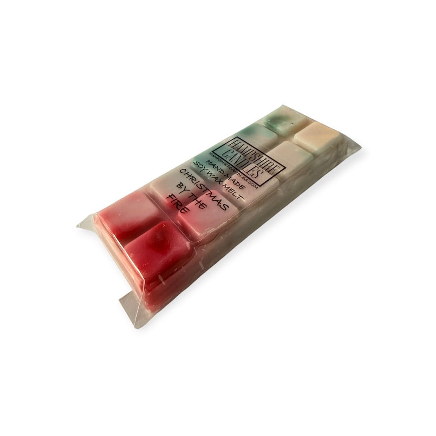Christmas By The Fire soy wax melt snap bar with orange, cinnamon, clove, pine and warm woody fragrance notes.