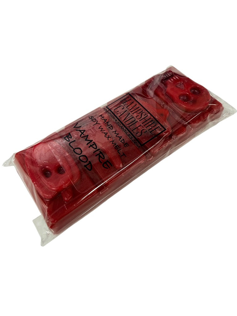 Close-up of Vampire’s Blood soy wax melt snap bar, hand-poured with premium soy wax and a rich blend of citrus, balsam and woody fragrance notes.