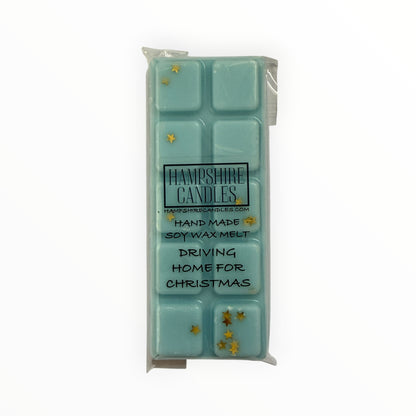Front view of the Driving Home For Christmas Mini Snap Bar wax melt with Hampshire Candles label