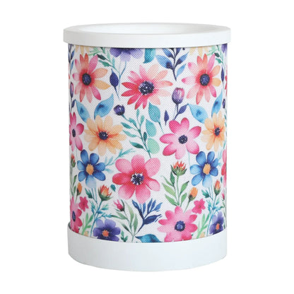 Daisy Floral Electric Wax Melt Burner 15cm illuminated with decorative floral pattern and warming wax melts.