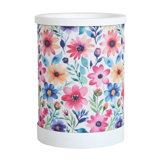 Daisy Floral Electric Wax Melt Burner 15cm illuminated with decorative floral pattern and warming wax melts.