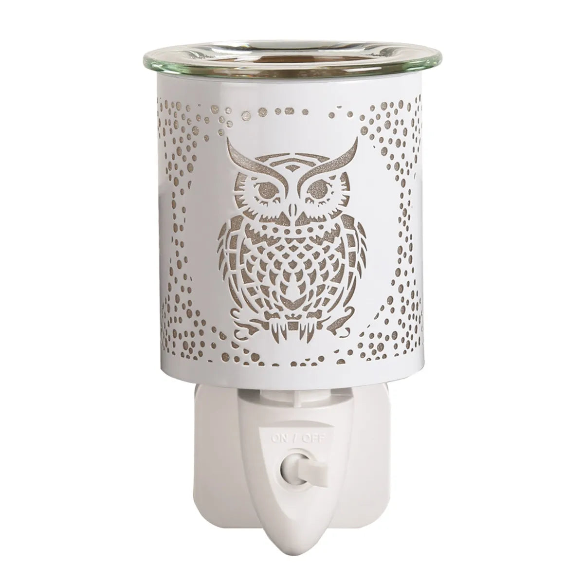 Decorative white and gold owl wax melt burner plugged into wall socket with wax melt dish on top