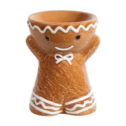 Gingerbread Man tealight wax melt burner 12cm with textured brown finish, white icing details, bow and smiling face.