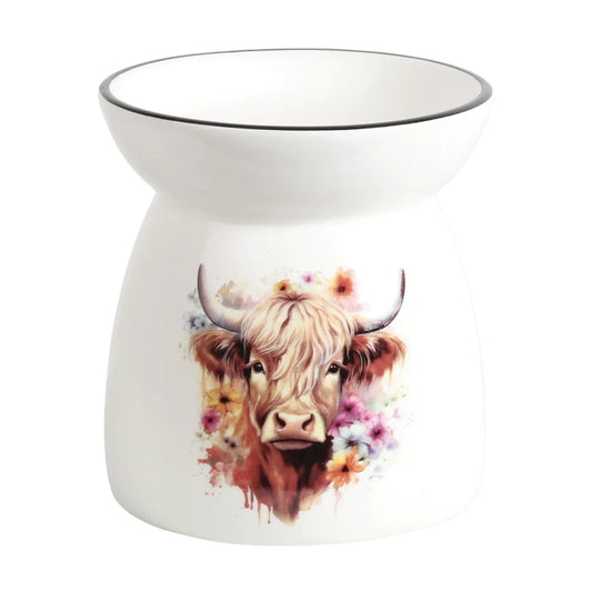Highland Meadow Highland Cow tealight wax melt burner 11cm in smooth white ceramic with delicate coloured floral detailing.