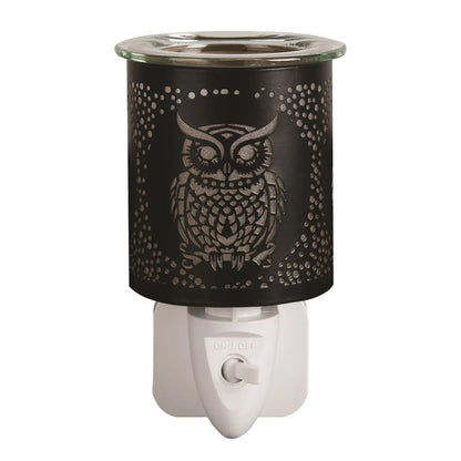 Illuminated black and gold owl wax warmer with decorative silhouette design