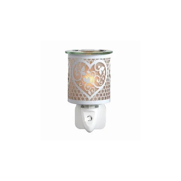 Illuminated white and gold heart wax warmer with decorative silhouette design