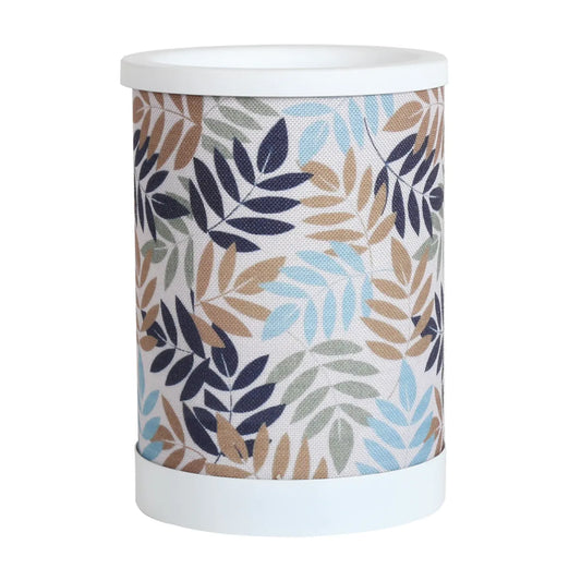 Leaves Electric Wax Melt Burner 15cm with decorative leaf pattern illuminated and warming scented wax melts.