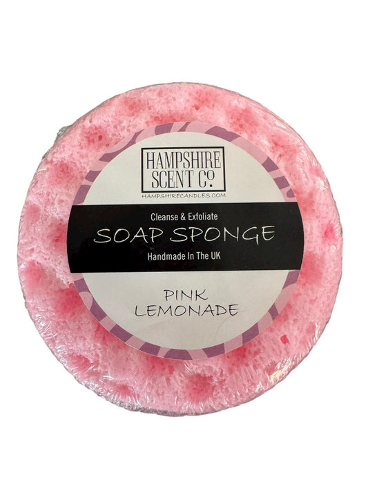 "Pink Lemonade soap sponge with vibrant citrus design on bathroom shelf"