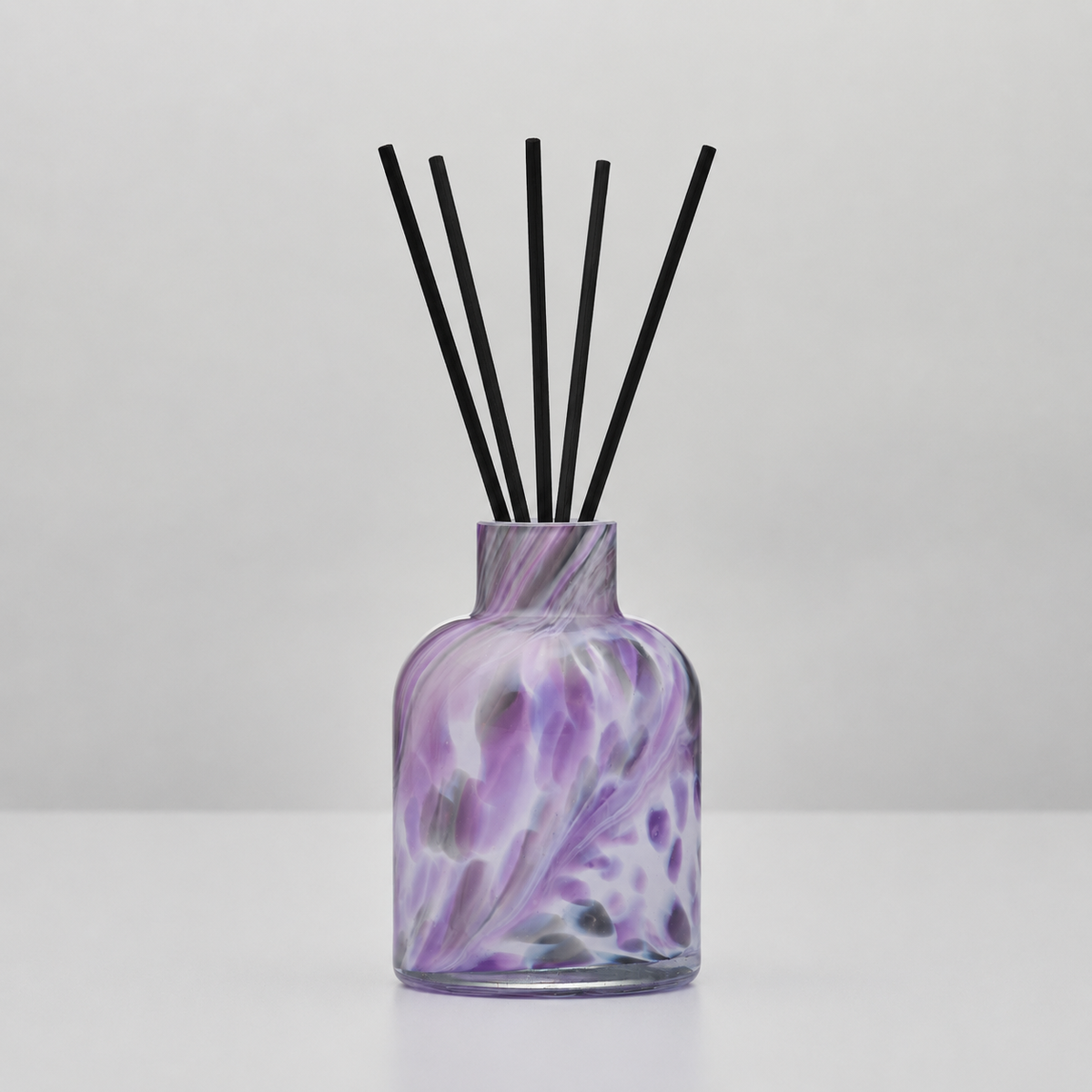 Lavender Haze mini decorative reed diffuser bottle in handcrafted glass
