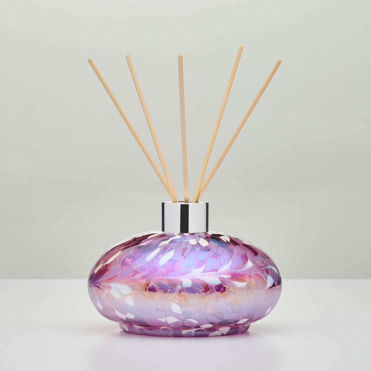 Violet decorative reed diffuser bottle in mouth-blown glass