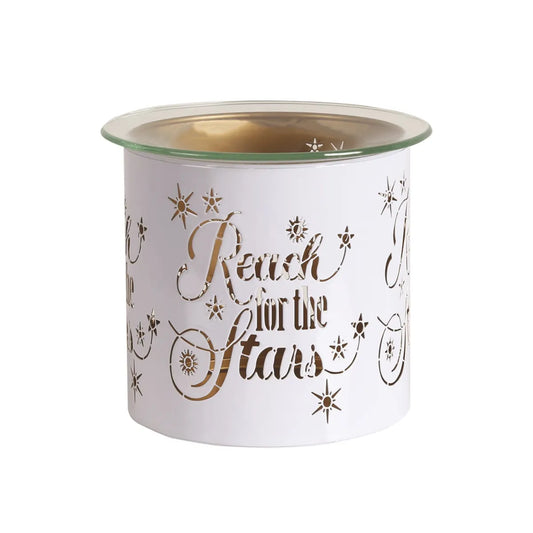 White and gold Reach wax burner illuminated with warm ambient glow
