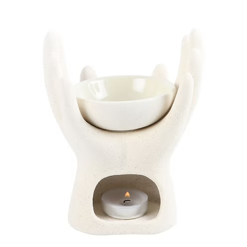 White ceramic Healing Hands wax warmer for soy wax melts and relaxing home fragrance