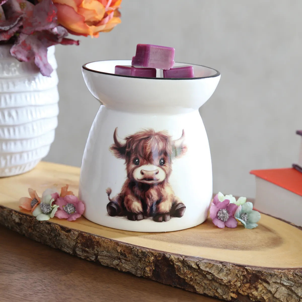 White ceramic Highland Calf wax warmer creating cosy home fragrance