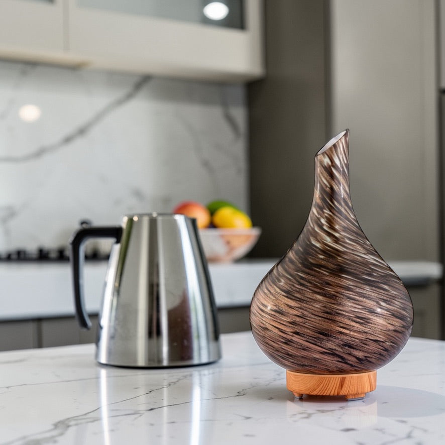 large ultrasonic aroma diffuser releasing mist with essential oils black brown design