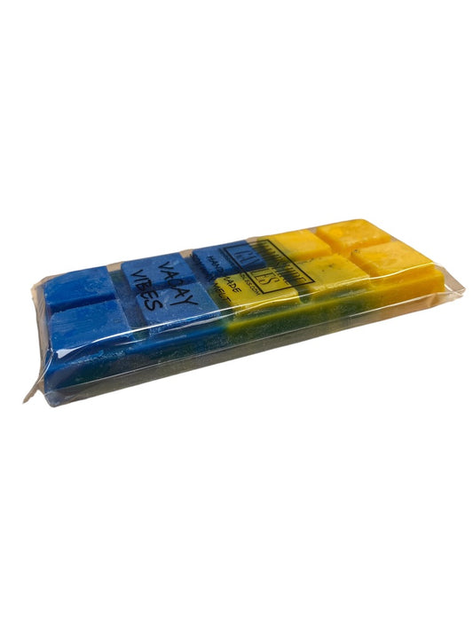 Vacay Vibes Wax Melts offering a tropical escape with fruity, refreshing notes perfect for relaxation. Use with a wax burner to enjoy this vacation-inspired scent