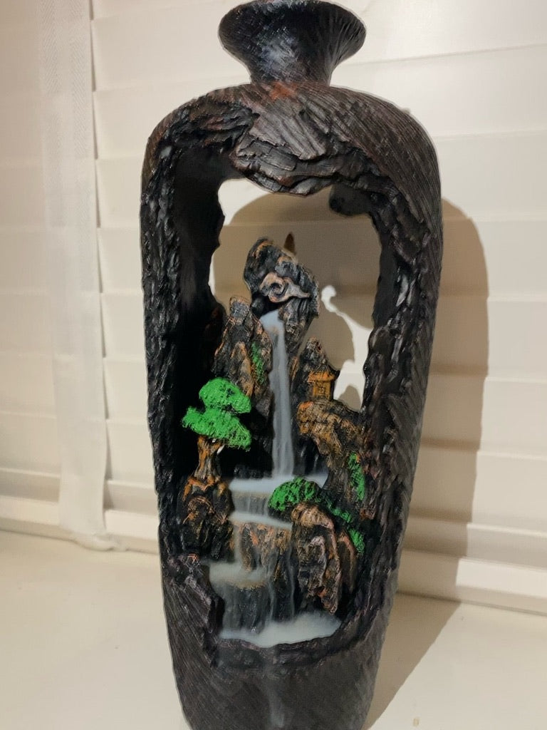 incense backlfow burner shaped as a vase with waterfall clifftop scene from hampshire Candles