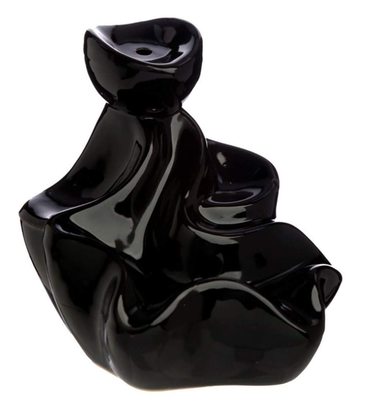 Black waterfall backflow incense burner with cascading smoke