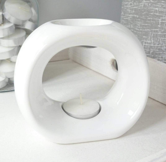 Modern white ceramic hoop wax melt burner with tealight holder. Ideal for home fragrance, wax melts, and aromatherapy oils.