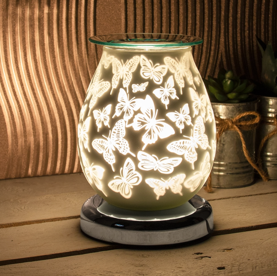 Electric wax melt and oil burner. With white satin butterfly design with touch sensitive on and off sold by Hampshire Candles